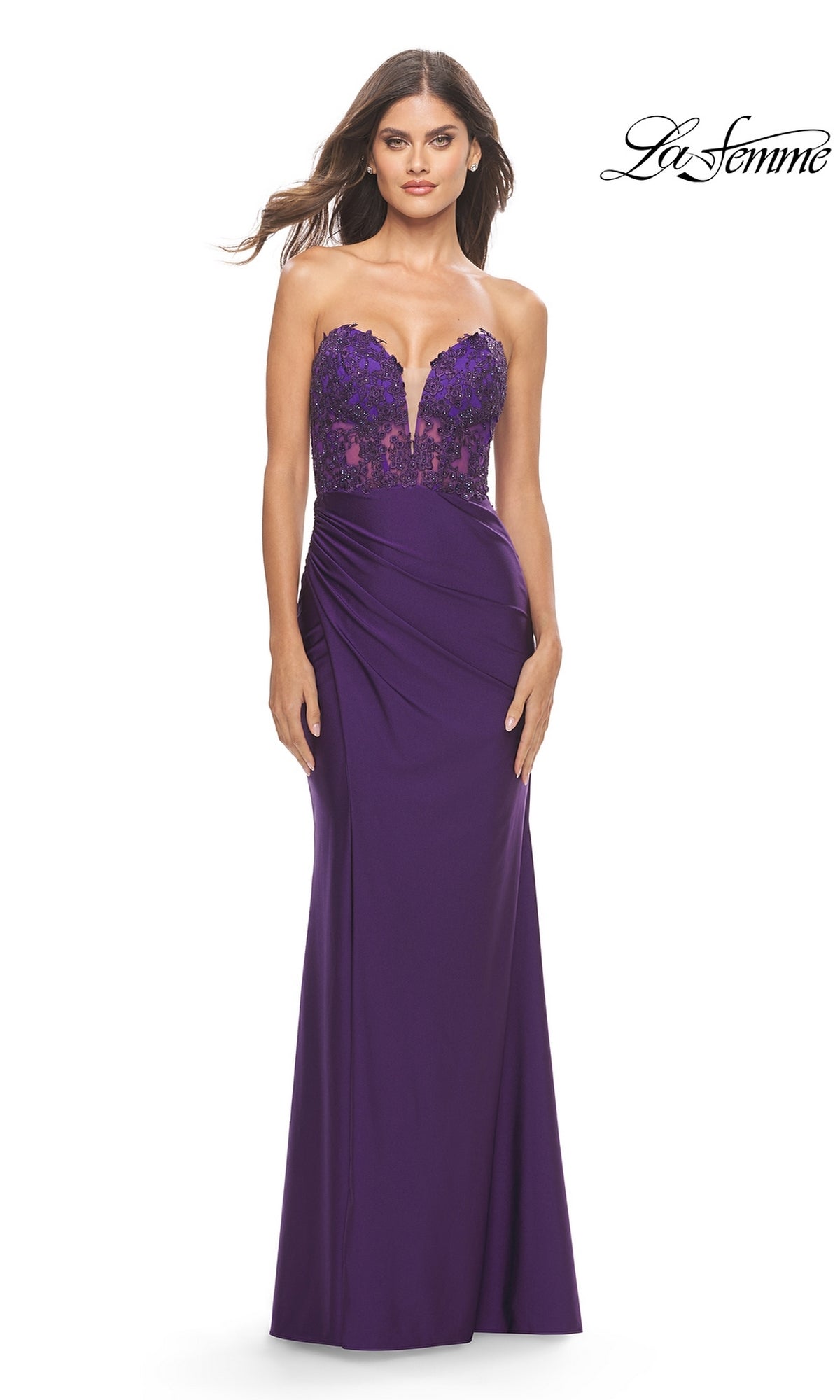 A woman models the La Femme Beaded-Lace-Bodice Long Prom Dress 31182, a strapless floor-length purple evening gown with elegant lace detailing on the bodice, standing against a white background.